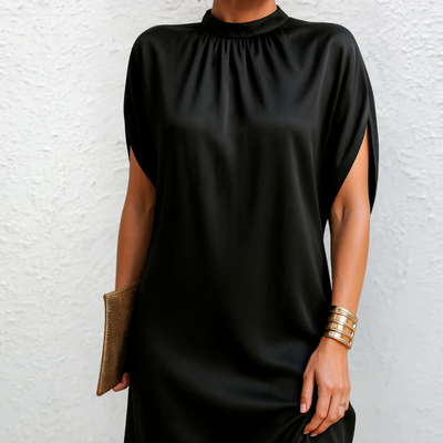 TRUDY – elegant, figursmickrande klänning